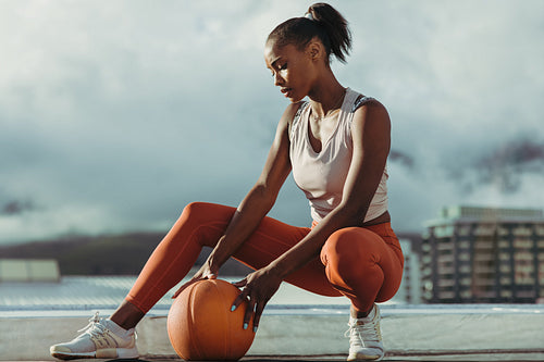 Fitness woman relaxing after exercising session