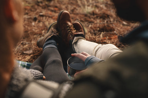 Hikers resting on mountain trail