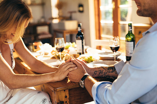 Couple having romantic meal at home