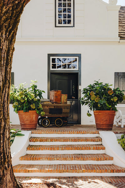 Hotel entrance with a trolley cart at the door