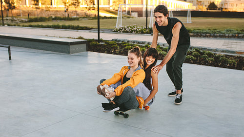 Friends having a great time at skate park