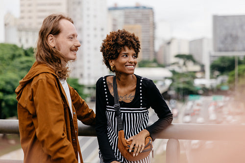 Affectionate couple enjoying a scenic city walk together