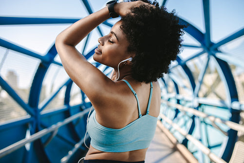 African woman relaxing after workout