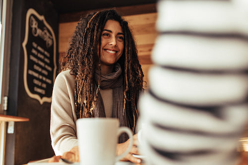 Woman sitting in a cafe with her friend