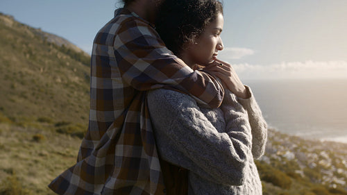 Romantic couple looking at the seascape