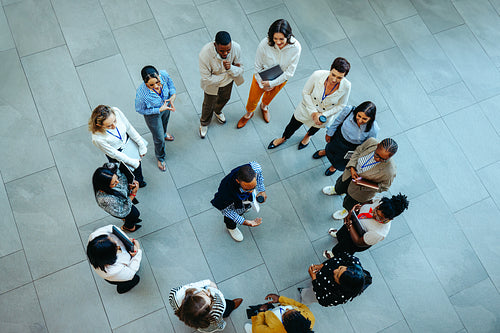Top view of diverse group in a business circle meeting