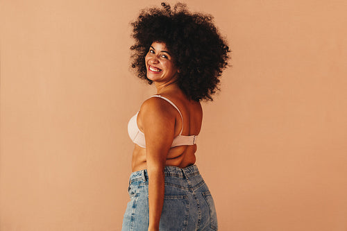 Gorgeous young woman feeling comfortable in her natural body