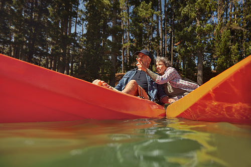 Mature couple enjoying a day at the lake