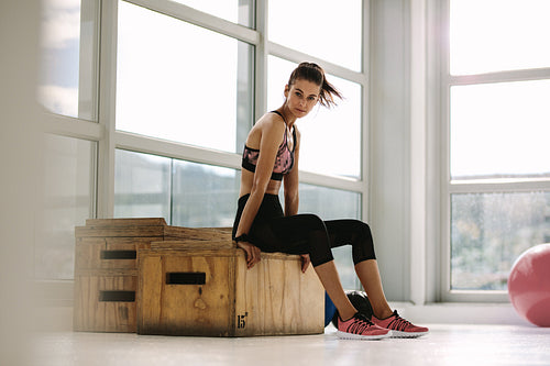 Female taking rest after fitness training