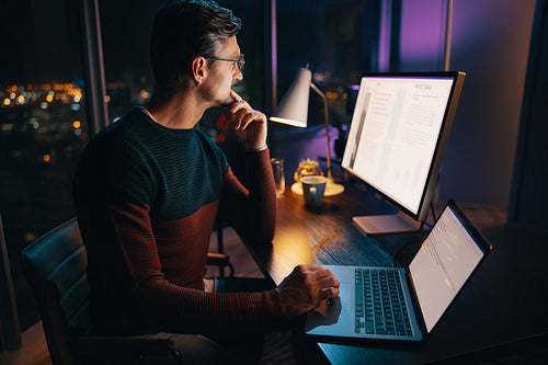 After hours business professional strategizing at late night office