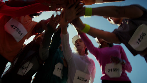 Runners celebrating a successful race