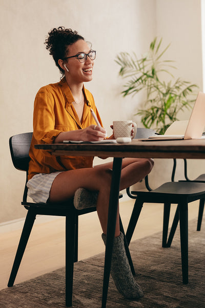 Woman in teleconference meeting