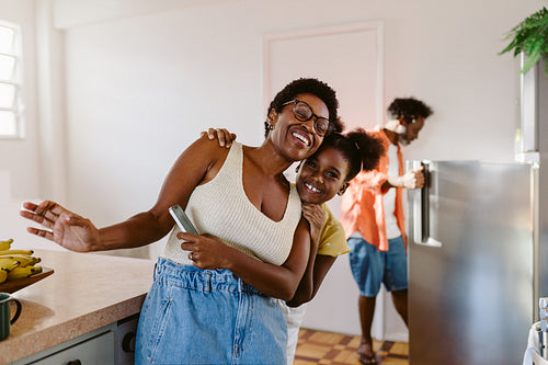 Mother and daughter sharing joyful moments at home