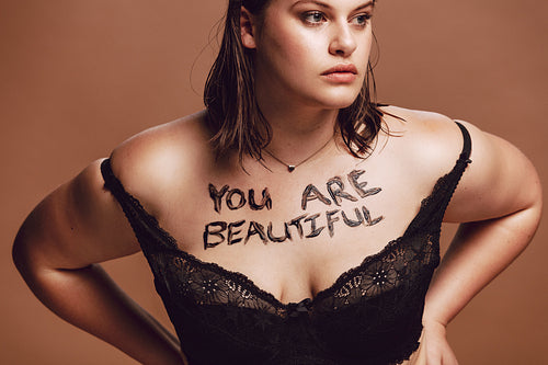 Plus size woman in black lingerie