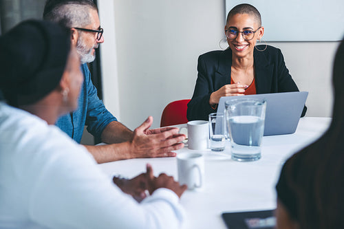 Diverse businesspeople having a briefing in a modern office