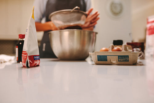 Pastry chef preparing cake