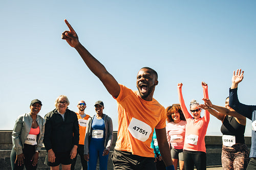 Triumphant moment for a diverse running club after a race