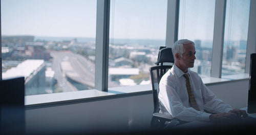 Mature businessman taking a break from work