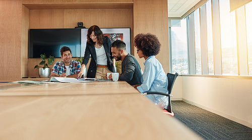 Multi ethnic business people meeting in conference room