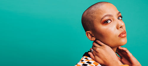 Woman with short hair looking at the camera confidently