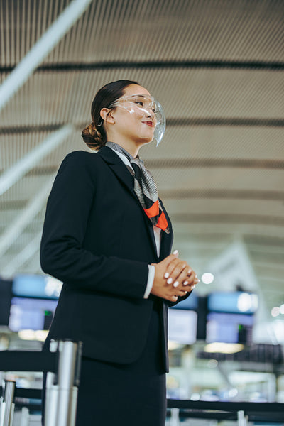Airlines staff during pandemic at departure gate