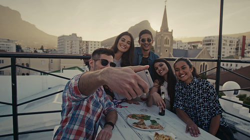 Selfie at rooftop party