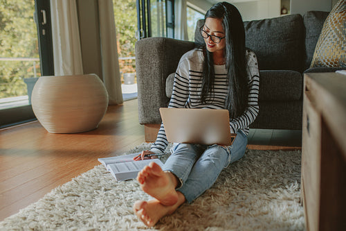 Female student studying at home