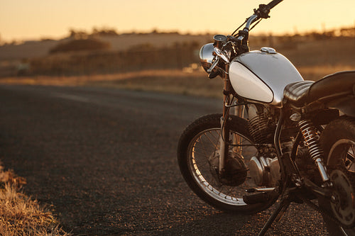 Vintage motorcycle on country road