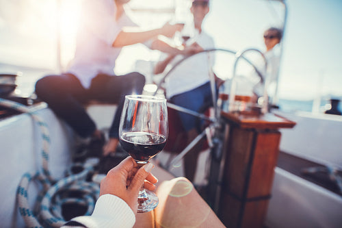 Wine glass in hand of a woman