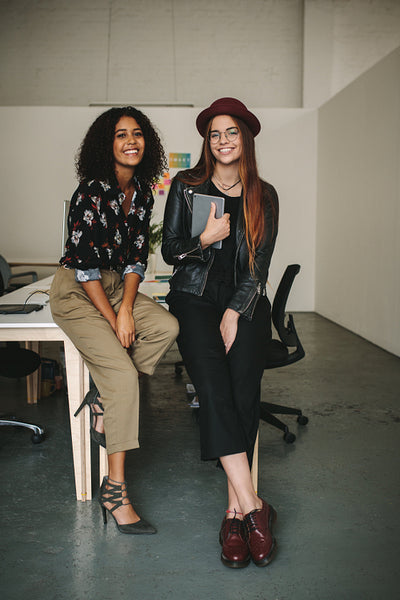 Cheerful business colleagues in the conference room at office