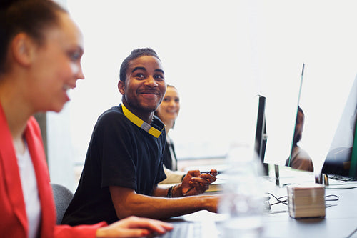 Young students using computers in classroom