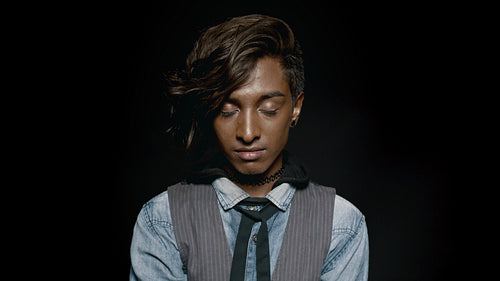  Fashionable indian man with eyes closed