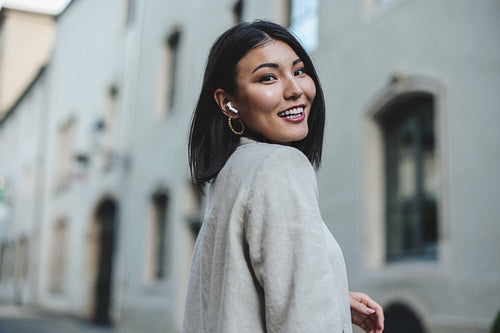 Woman exploring a city during vacation