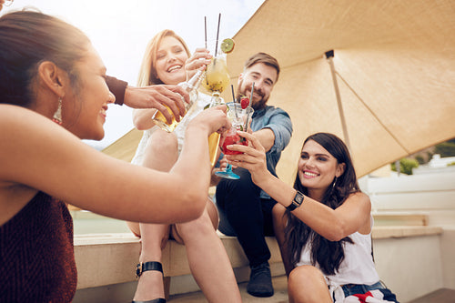Multiracial young friends partying together