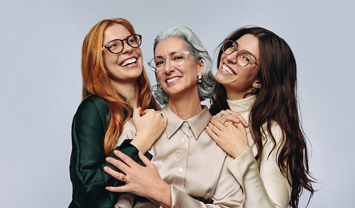 Women of different ages wearing eyeglasses in optometry campaign