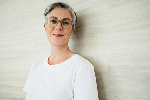 Mature businesswoman looking at the camera in an office