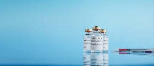 Vials of corona virus vaccine and injection