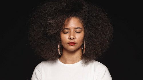 Portrait of a woman in afro hairstyle