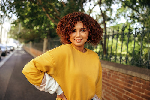 Smiling teenage girl looking at the camera