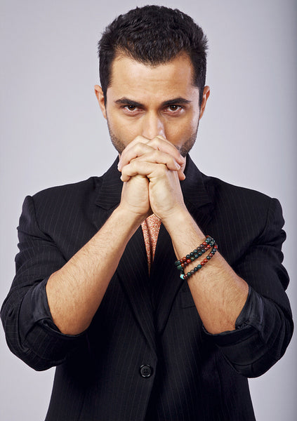 Anxious Man with Hands Clasped