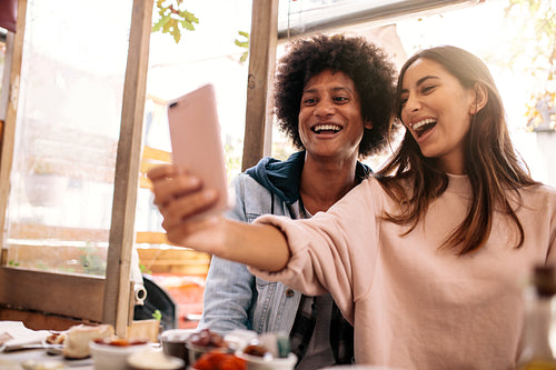 Beautiful young couple taking self portrait