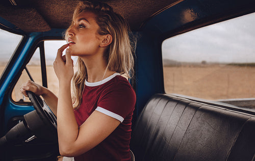 Beautiful woman on a road trip
