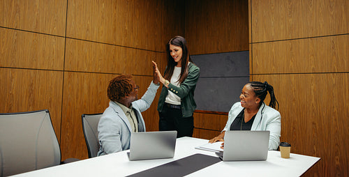 Successful business meeting in modern boardroom setting