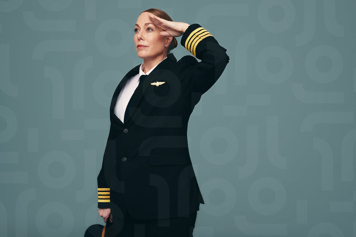 Professional pilot saluting while standing in a studio – Jacob Lund ...