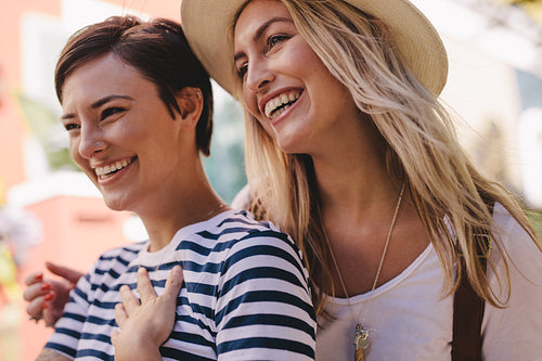 Cheerful friends having fun outdoors