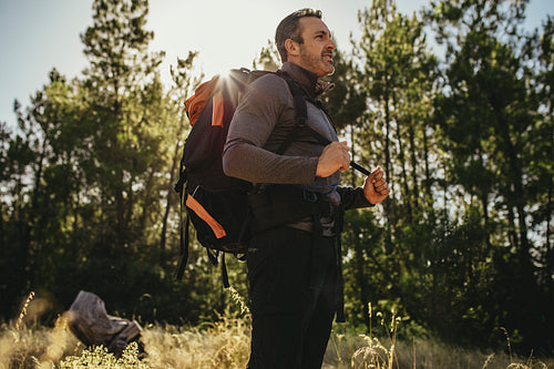 Camper exploring a place for camping