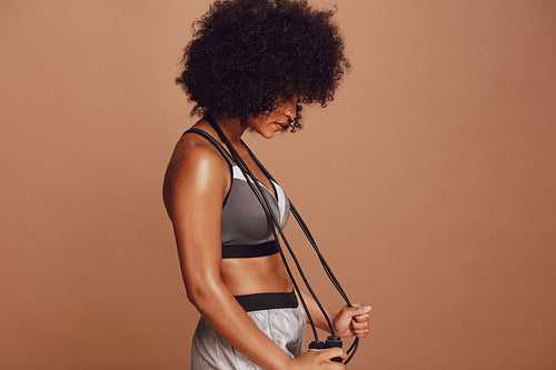 African young woman with a jump rope