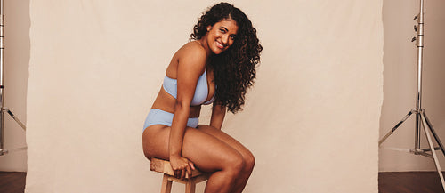 Carefree young woman feeling comfortable in her own body