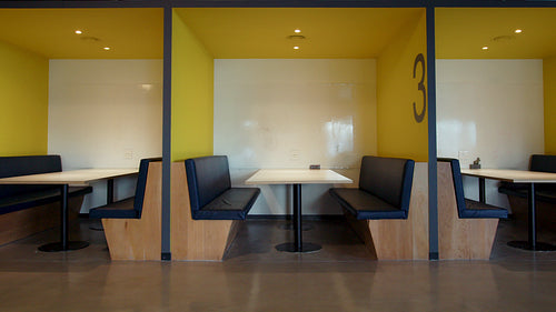 Coworking space interior showing empty working areas