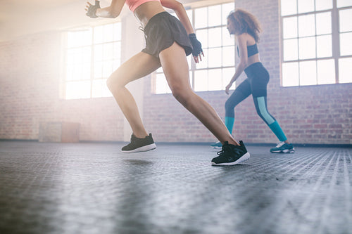 Women exercising in healthclub